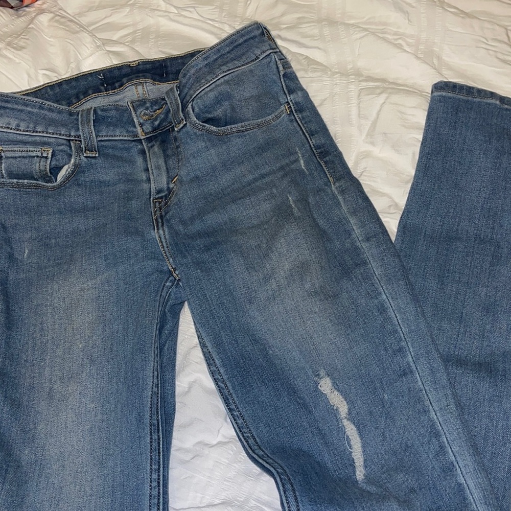 My worn, Levi’s jeans.